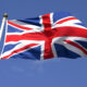 Union Jack flag with blue sky background