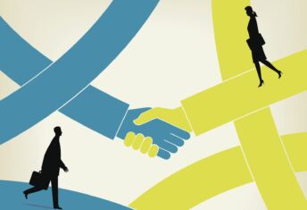 Illustration of two hands shaking with two business people walking by. Source - Getty