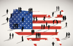 Diverse manager programmes live on amid DEI rollback Silhouettes of people standing on the US flag.