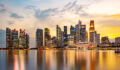 Temasek to scale infra exposure, cites energy transition opportunities Moody Sky at Sunset with Reflection in Marina Bay, Long Exposure to Blur Water