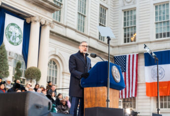 Adam Levine in front of the Office of NYC Comptroller.