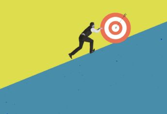 A person pushing a target upwards