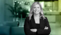 Image of Kate Roscoe with an backround with NPM colours.