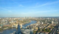 In brief: London pension nears impact allocation target London, England, 14 September 2023: Tower Bridge, Canary Wharf and the London city skyline seen from high up.