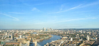 London, England, 14 September 2023: Tower Bridge, Canary Wharf and the London city skyline seen from high up.